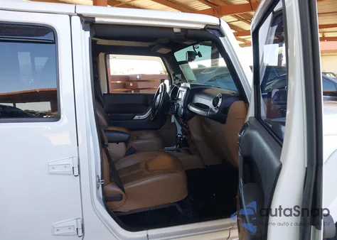 2015 Jeep Wrangler Unlimited Sahara from USA, damaged, VIN 1C4BJWEG6FL556500